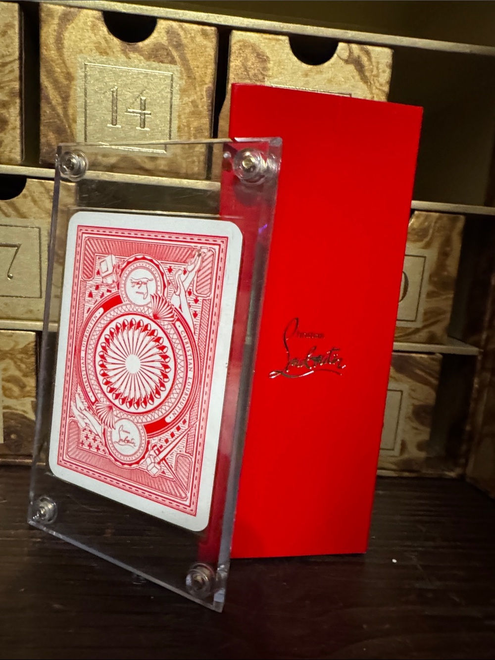 Christian Louboutin Red lipstick & and collectors playing card